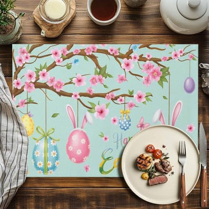 Happy Easter Placemats Set of 4, Spring Floral Bunny Rabbit Ear Eggs Heat Resistant Dining Table Mats Holiday Farmhouse Decor for Kitchen&Linens Outdoor Indoor, Pink Flower Branch Green Leaves